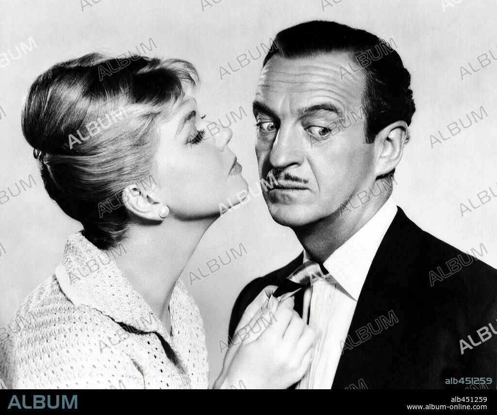 DAVID NIVEN and DORIS DAY in PLEASE DON'T EAT THE DAISIES, 1960, directed by CHARLES WALTERS. Copyright M.G.M.