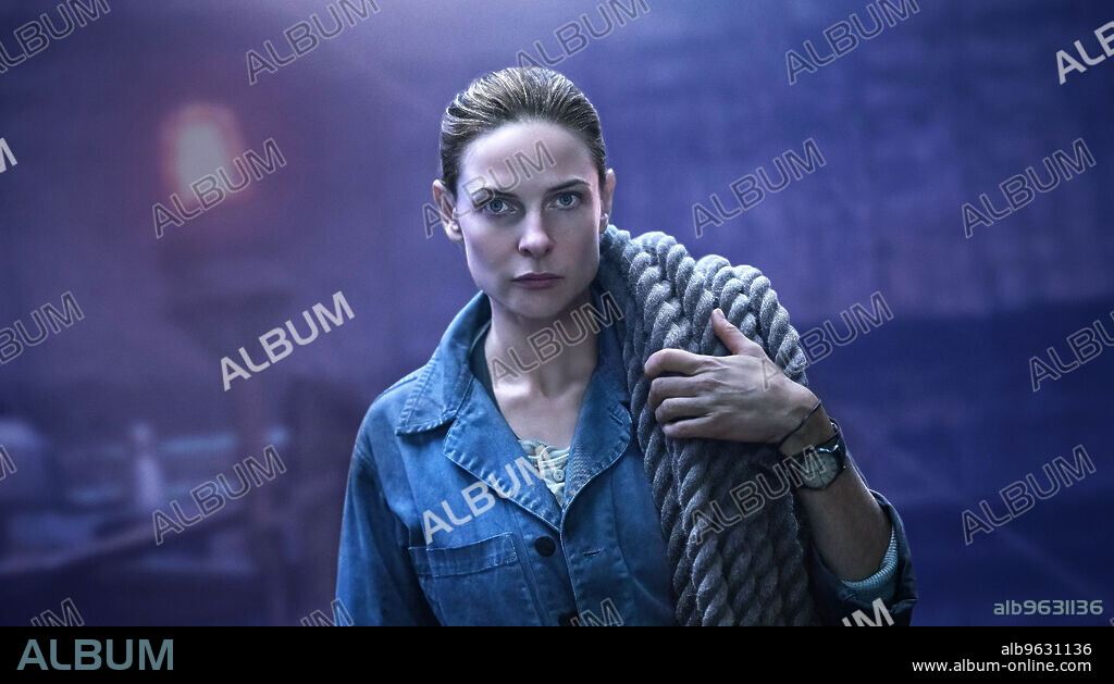 REBECCA FERGUSON in SILO, 2023, directed by DAVID SEMEL and MORTEN TYLDUM. Copyright AMC Studios.