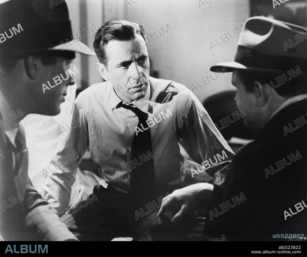 HUMPHREY BOGART en EL HALCÓN MALTÉS, 1941 (THE MALTESE FALCON), dirigida por JOHN HUSTON. Copyright WARNER BROS/FIRST NATIONAL.