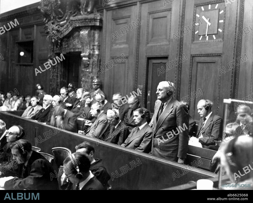 The accused Otto Ambros (standing) during the sentencing. He was sentenced to eight years imprisonment for slave labor. The suit against 23 directors of IG-Farben group started on 14 August 1947, before the American military court VI in Nuremberg, headed by Judge Curtis Shake. 30/08/1948