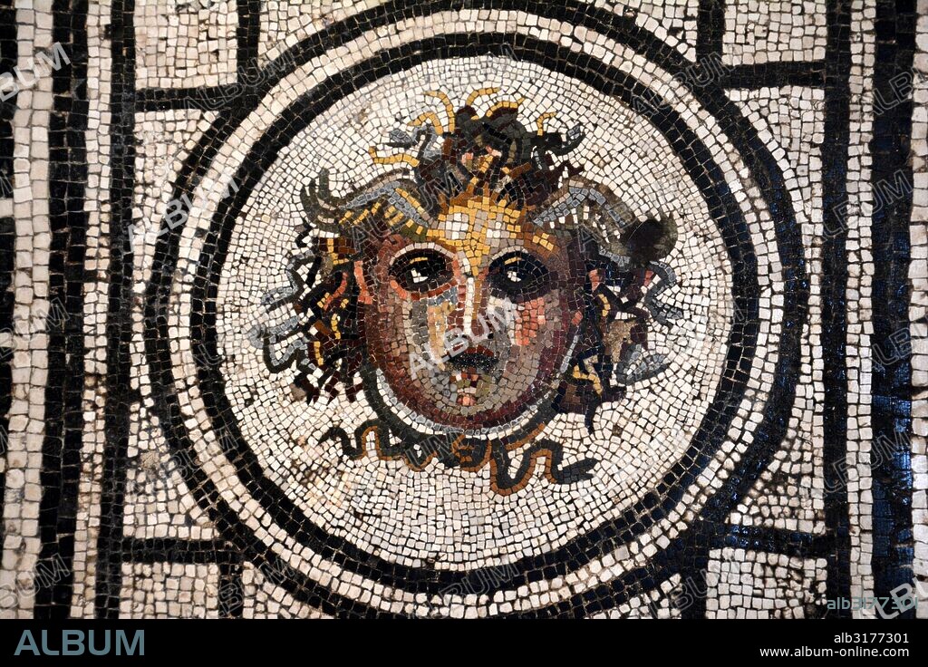 Pompeii, House of the Vestals. Detail of mosaic with the head of Medusa. Now at the Archeological Museum in Naples. Country of Origin: Italy. Culture: Roman. Period/ Date: re-modelled in the early 1st C AD. Credit Line: Werner Forman Archive/ N.J Saunders.