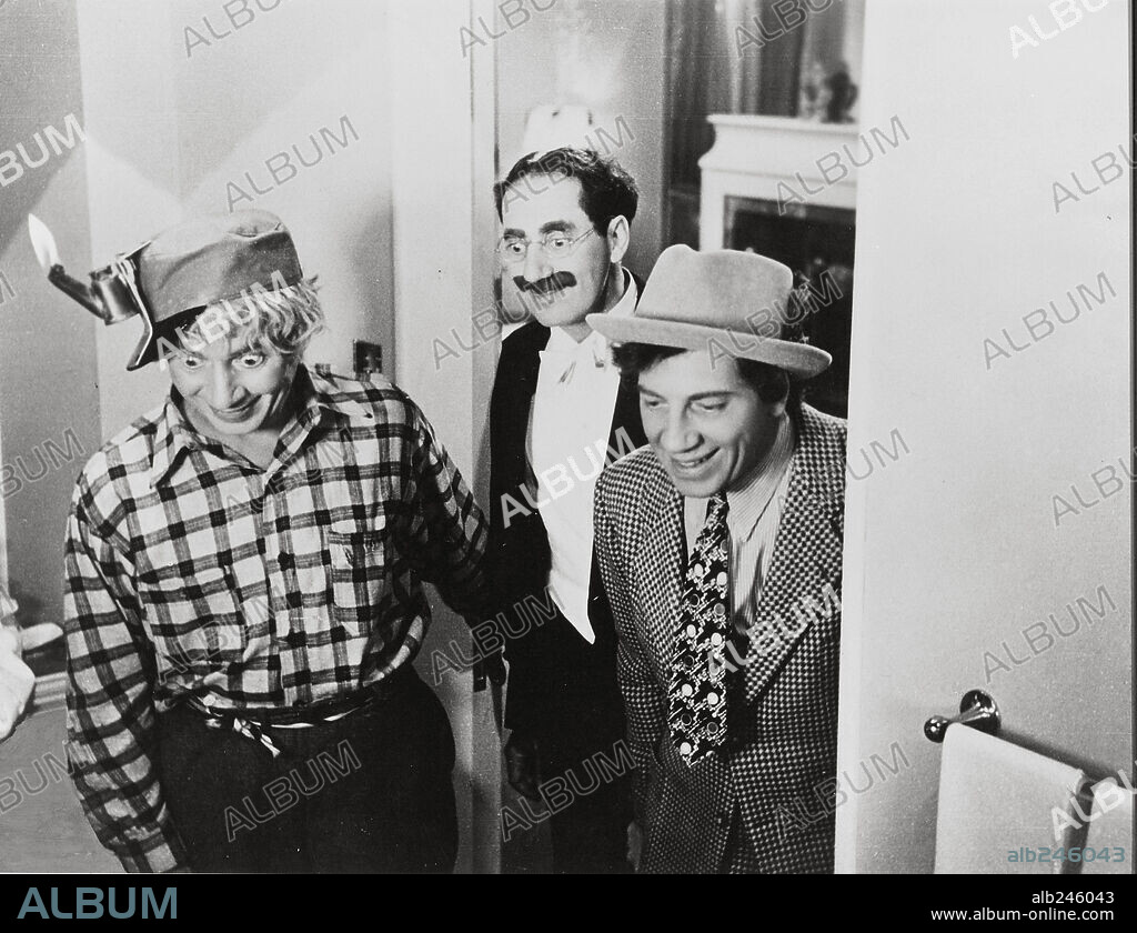 CHICO MARX, GROUCHO MARX, HARPO MARX and THE MARX BROTHERS in ROOM SERVICE,  1938, directed by WILLIAM A. SEITER. Copyright RKO. - Album alb246043