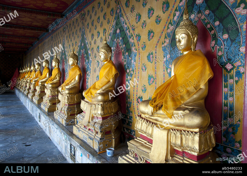 Thailand A row of Buddhas in the main temple complex Wat Arun