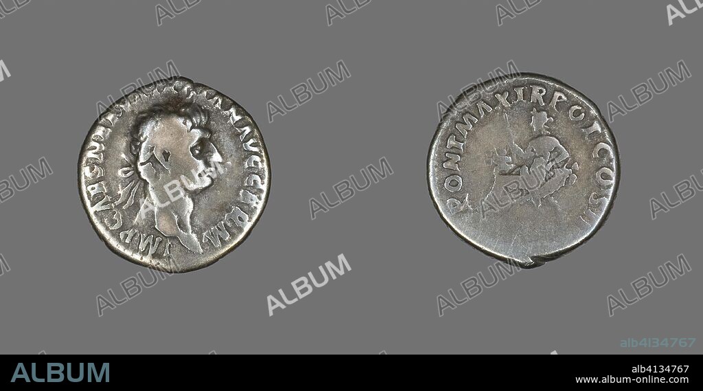 ANCIENT ROMAN. Denarius (Coin) Portraying Emperor Trajan. Roman, minted in Rome. Date: 98 AD-99 AD. Dimensions: Diam. 1.8 cm; 2.87 g. Silver. Origin: Roman Empire.