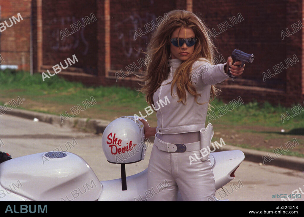 DENISE RICHARDS in UNDERCOVER BROTHER, 2002, directed by MALCOLM D. LEE. Copyright UNIVERSAL PICTURES.