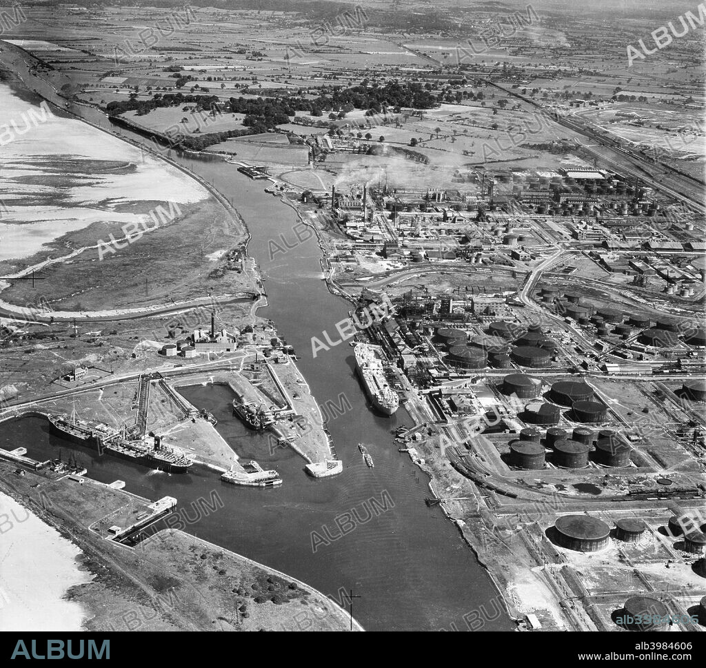 Ellesmere Port, Cheshire, 1946. The Stanlow Oil Refinery alongside the Manchester Ship Canal and Docks.