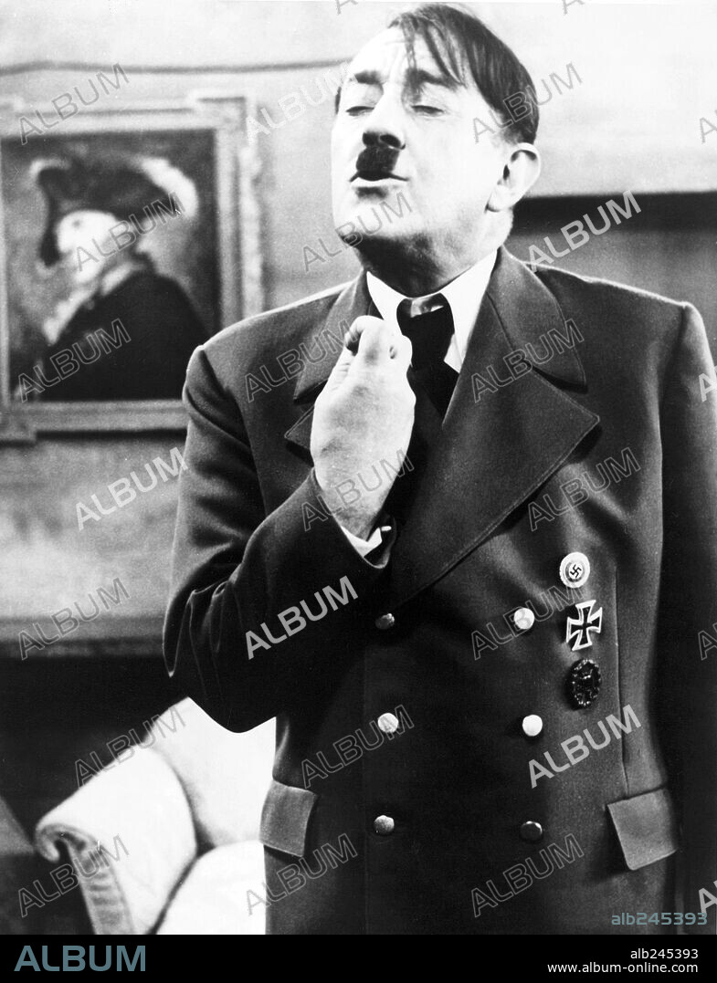 Adolf Hitler and ALEC GUINNESS. ALEC GUINNESS in HITLER: THE LAST TEN DAYS, 1973, directed by ENNIO DE CONCINI. Copyright PARAMOUNT PICTURES.