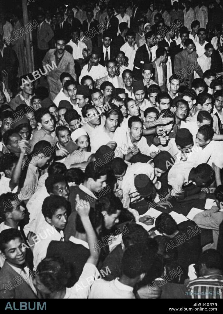 Recruiting For Volunteer Armies To "Save Palestine From The Zionists" Opens In Cairo -- This photo shows a General view of the registration table at Cairo, Oct. 14, where recruits are signing up for Voluntler Arab Army "To save Palestine from the Zionists". Then this photo was taken 200/300 Arabs had signed up for the Jihad (Holy Moslem War) against the creation of a Jewish state in the Holy land. October 16, 1947. (Photo by Associated Press Photo).