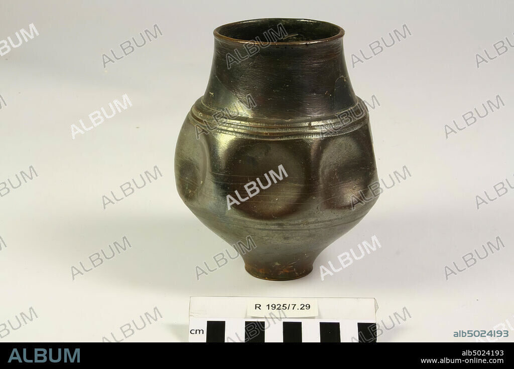 Goblet of shiny, black painted earthenware. Open bursts on the belly (measuring 1 by 1 cm), bonding and supplementing., Cup, dented cup, earthenware, h: 15 cm, diam: 12,3 cm, France.