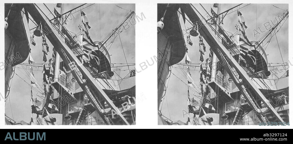 Battleships – The battle tower and signal flag lines. The crane used for lifting and lowering the transport boats is seen in the foreground.