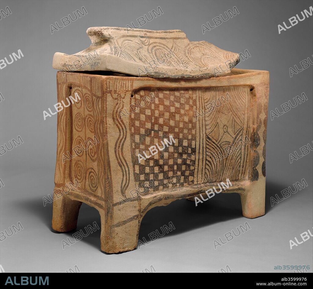 Terracotta larnax (chest-shaped coffin). Culture: Minoan. Dimensions: Overall with lid  40 x 18 x 42 1/4 in. (101.6 x 45.7 x 107.3 cm)
H. of body  30 1/2 in. (77.5 cm)
H. of lid  9 1/2 in. (24.1 cm). Date: mid-13th century B.C..
The larnax was the standard type of coffin in Crete from the early fourteenth century to the twelfth century B.C. The structure with recessed panels on each side suggests a wooden prototype, and recent scholarship has identified Egyptian chests as the probable models. The decoration on each side consists of geometric and vegetal ornaments well represented on contemporary pottery. The larnax stands at the beginning of an impressive series of large-scale funerary monuments in the Greek and Roman collection.