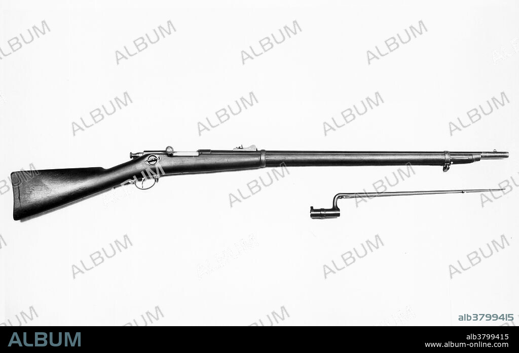 Winchester Hotchkiss rifle, model 1878, .45 caliber. This was a bolt-action repeating rifle manufactured by Winchester Repeating Arms Company, New Haven, Connecticut.