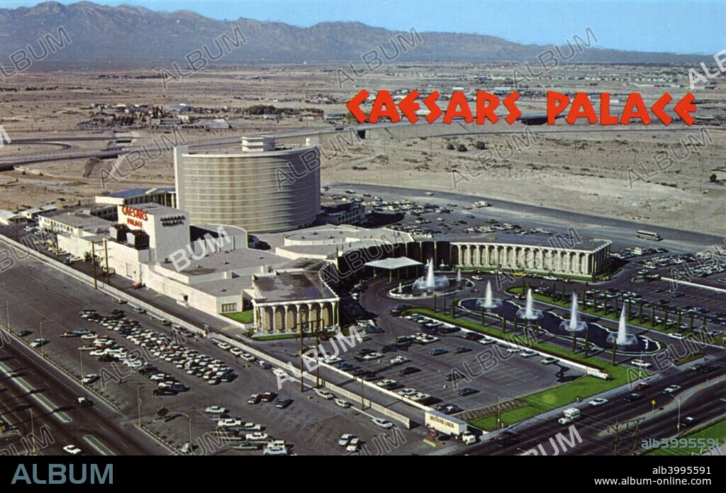 Caesars Palace, Las Vegas, Nevada, USA, 1967. Vintage postcard showing a bird's eye view of Caesars Palace and the surrounding area. Mountains are visible in the distance. The Roman themed Caesar's Palace hotel and casino opened in 1966.