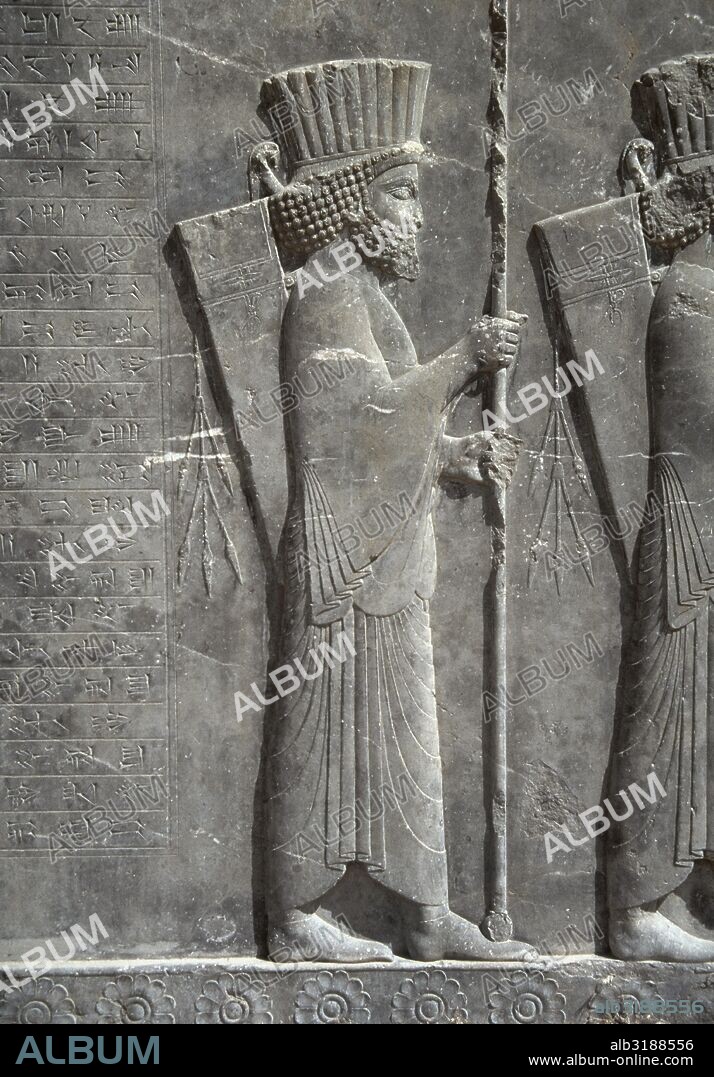 Persepolis. Reliefs of the monumental stairways of the Apadana or Audience Hall (5th-6th centuries BC). Relief depicting a Persian soldier with a headdress of a Xerxes I (486-465 BC) and Artaxerxes I (464-425 BC) period. Islamic Republic of Iran.