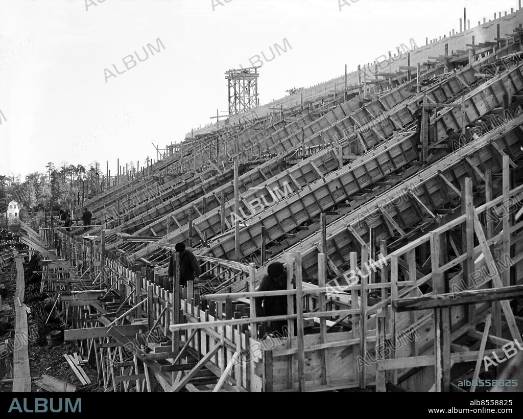 STOCKHOLM 1936 (FILE). Building the Råsunda fotbollsstadion, Swedish national football stadium.. The inaugural match took place on 18 April 1937 when AIK played against Malmö FF, AIK won the match 4–0.. The last Allsvenskan football match on the arena before demolition, also AIK vs Malmö FF, is played on Nov. 4, 2012. Photo: Scanpix Historical / Kod:1900. SCANPIX SWEDEN.