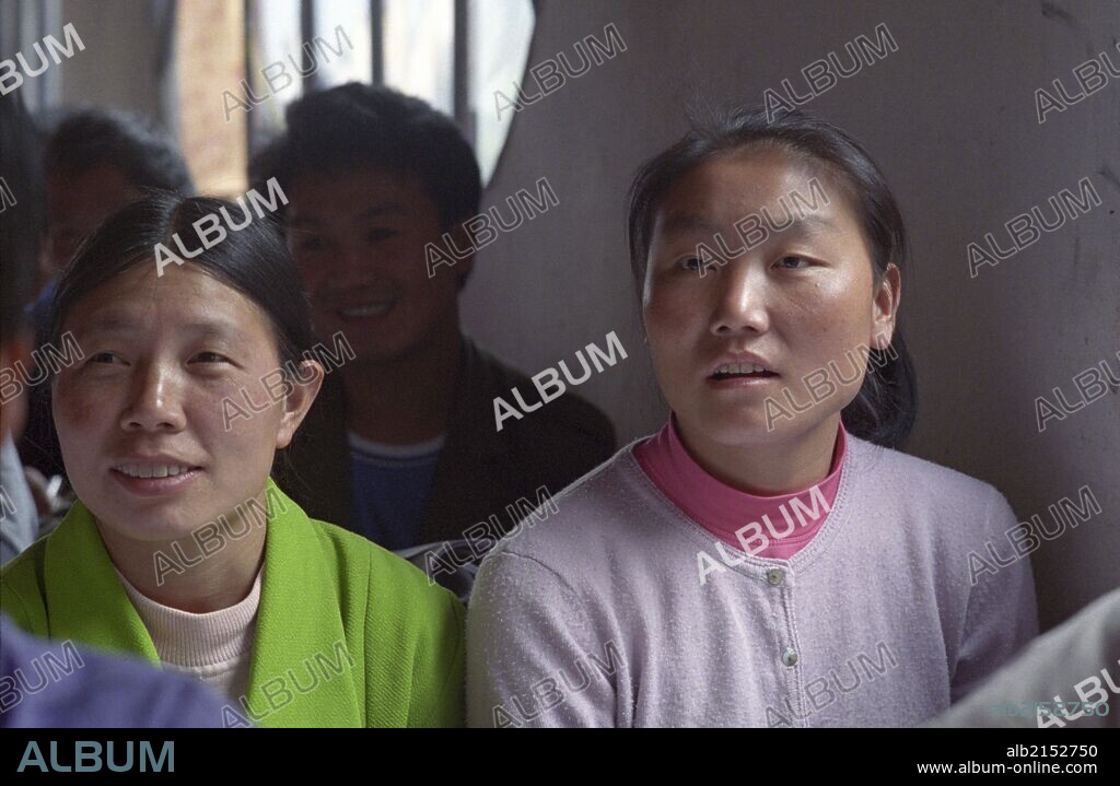 Lisu, Nu and Tibetan village people in class to study bible lessons taught by an American/Chinese missionary - Gongshan - Nujiang Valley - Yunnan Province, China (Photo by: Sovfoto/UIG via Getty Images).